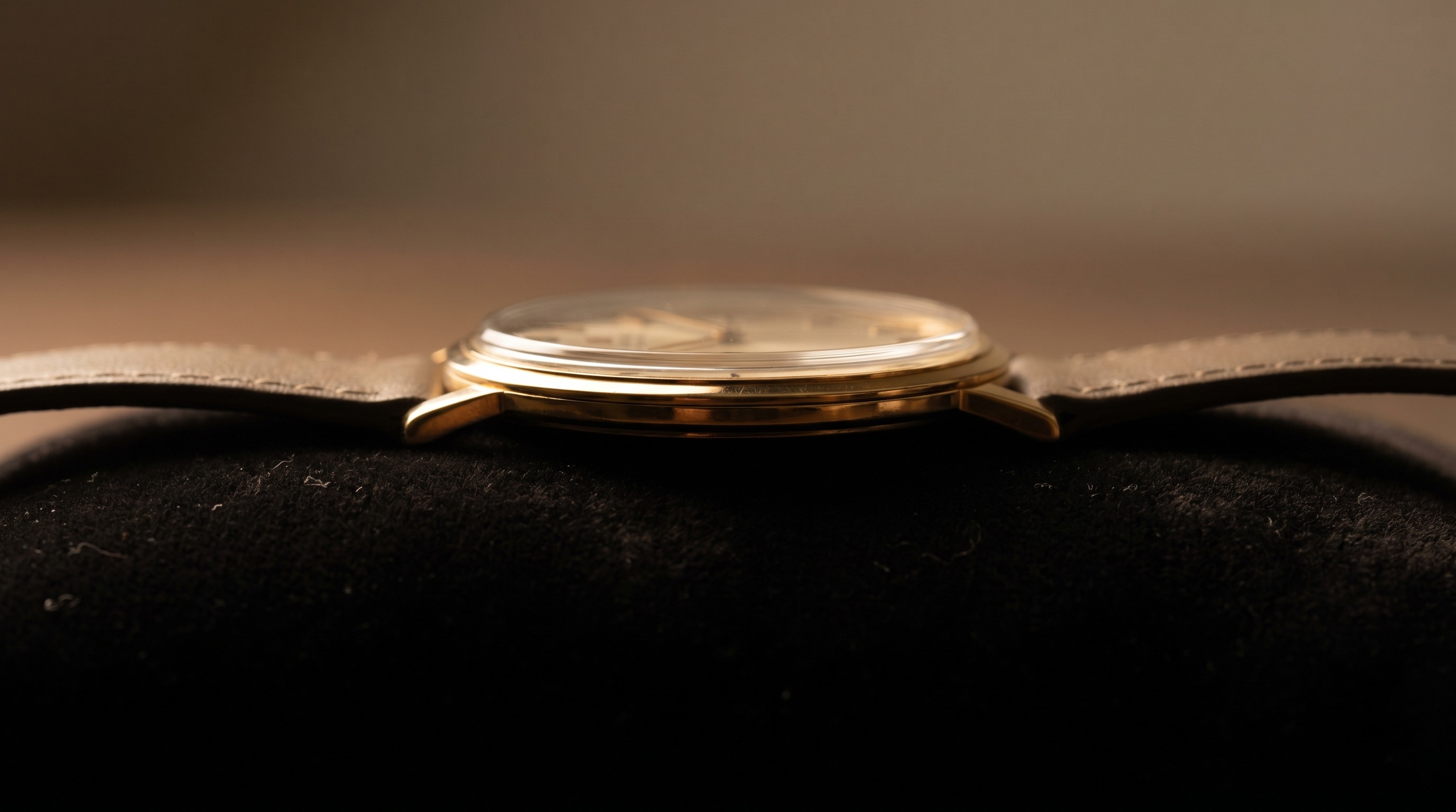 Side profile of an extremely thin vintage gold dress watch