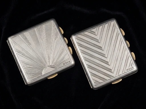 An Art Deco silver cigarette case with engine-turned geometric decoration