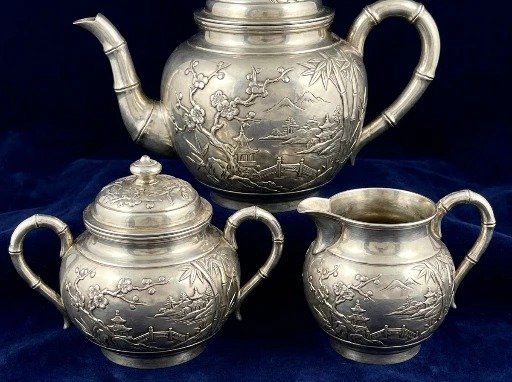 Antique Chinese export silver with densely chased dragon decoration