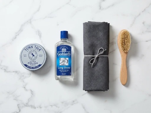 A selection of silver polishes including wadding and cream products