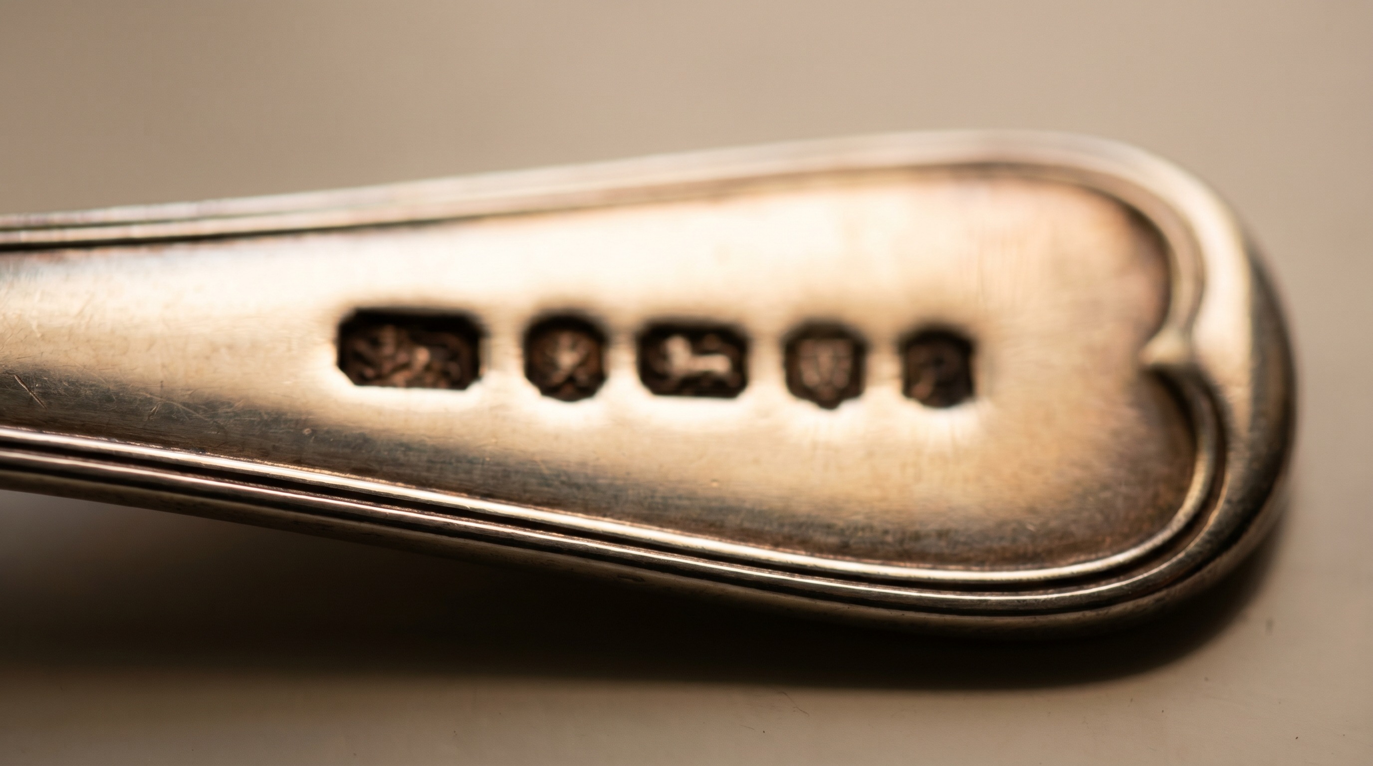 British silver hallmarks on the back of an antique christening spoon
