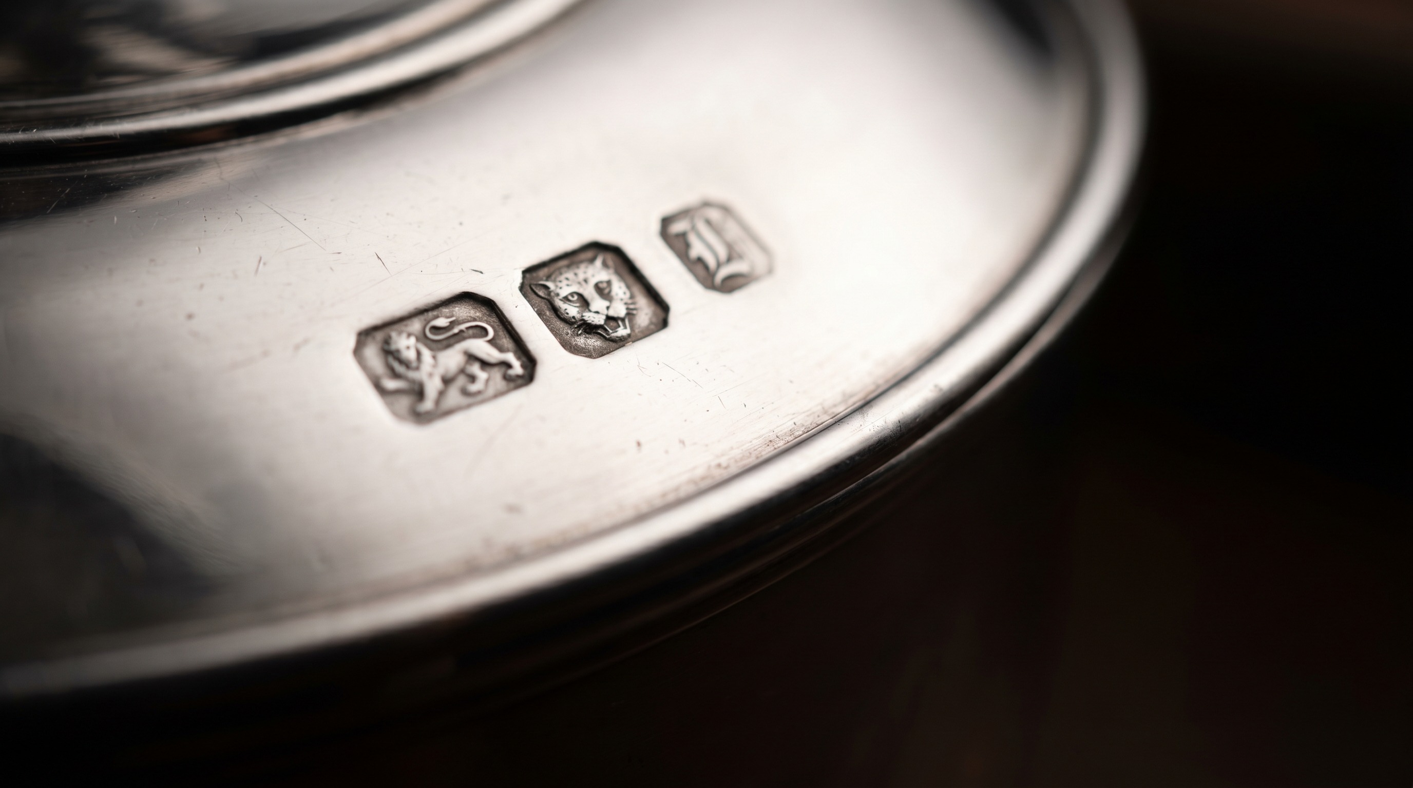 British silver hallmarks on an antique entrée dish