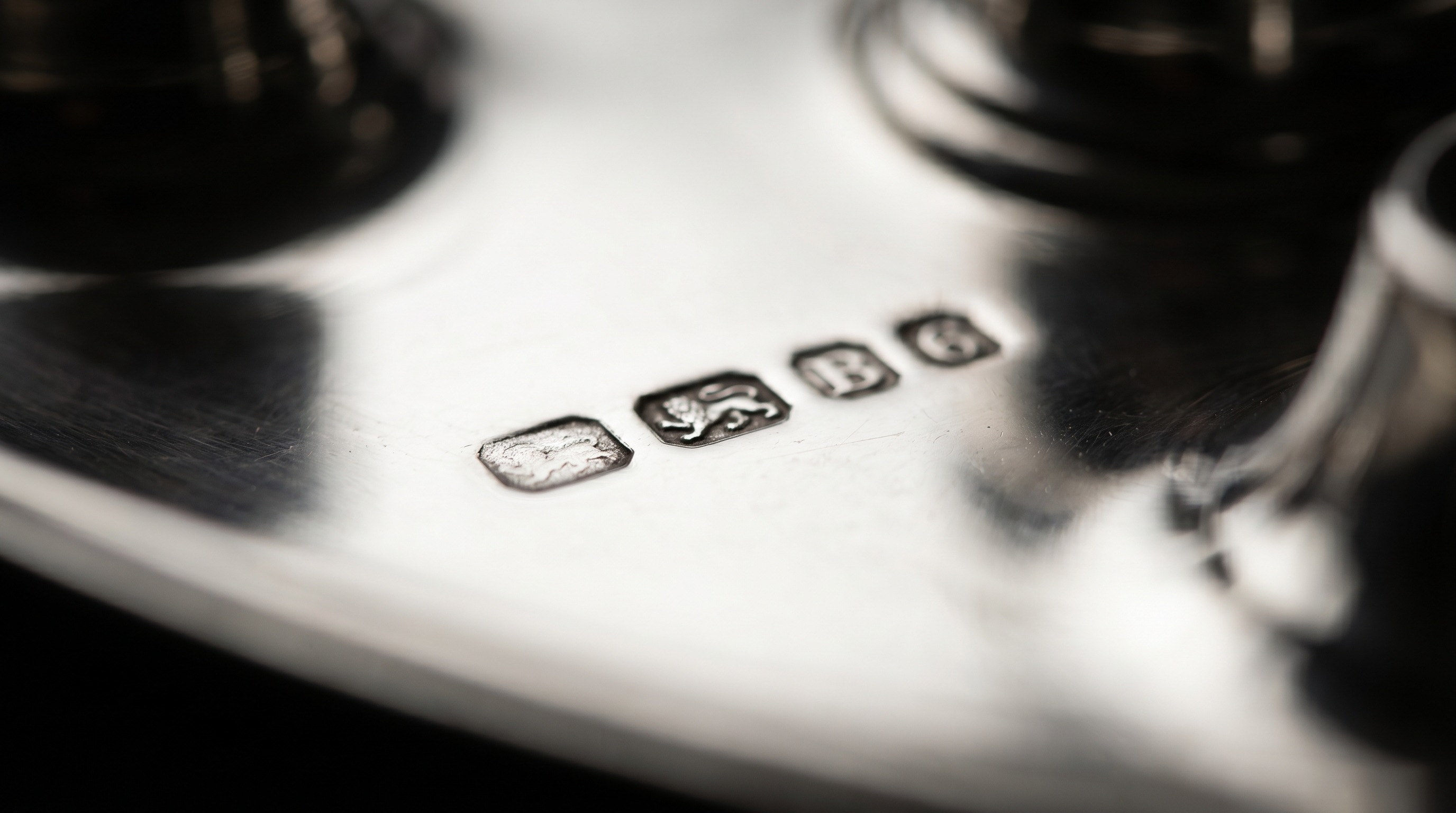 British silver hallmarks on the tray of an antique inkstand