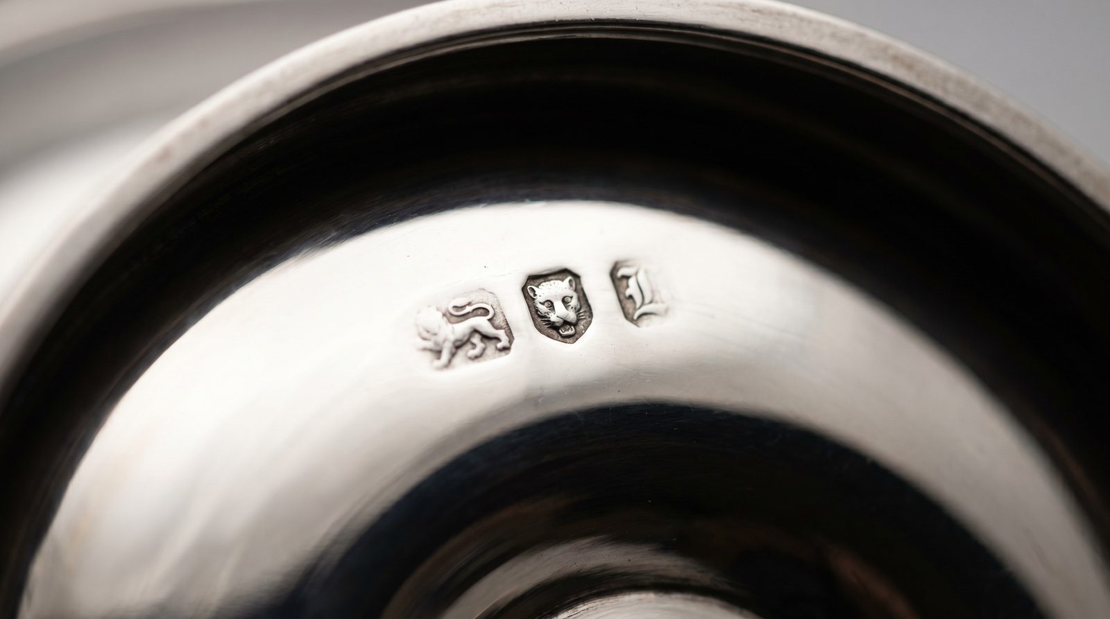British silver hallmarks on the base of an antique soup tureen