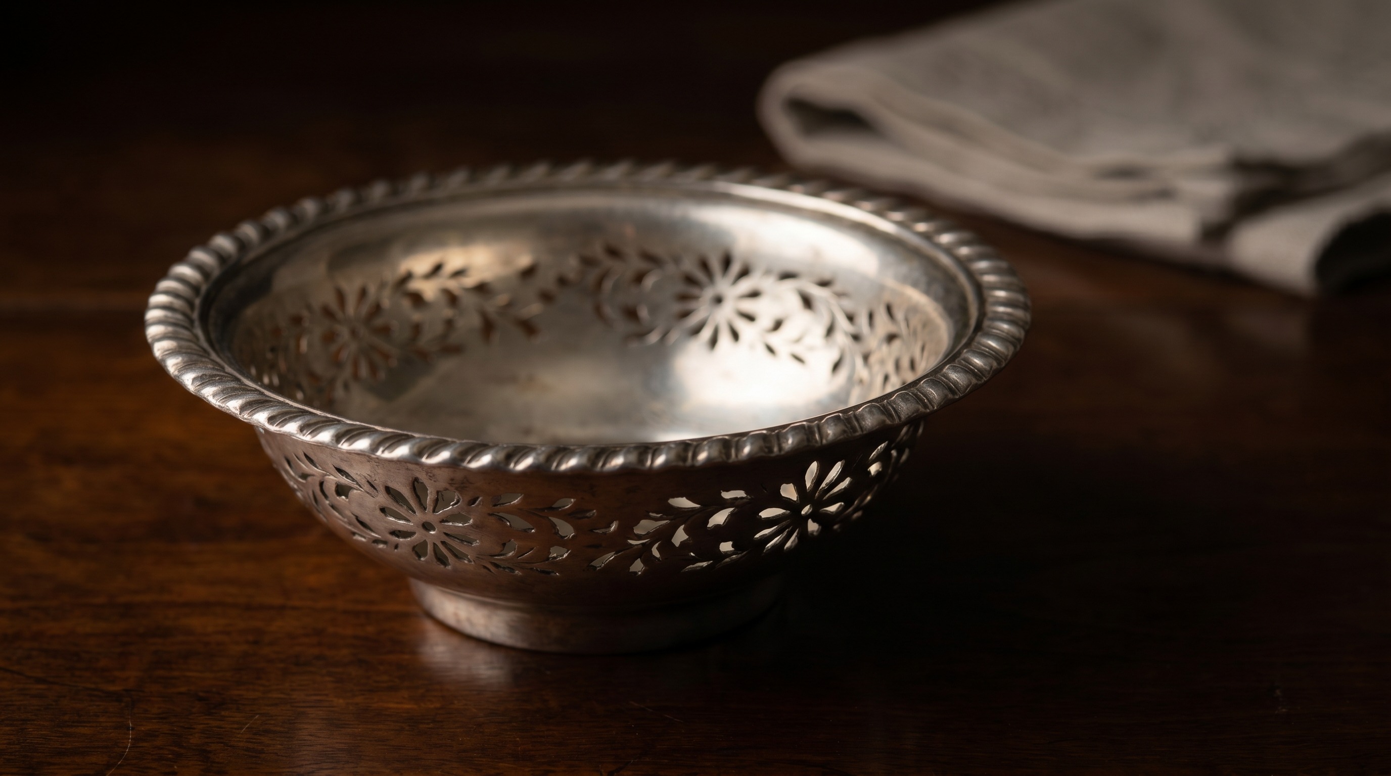 Pierced strainer bowl of an antique silver wine funnel