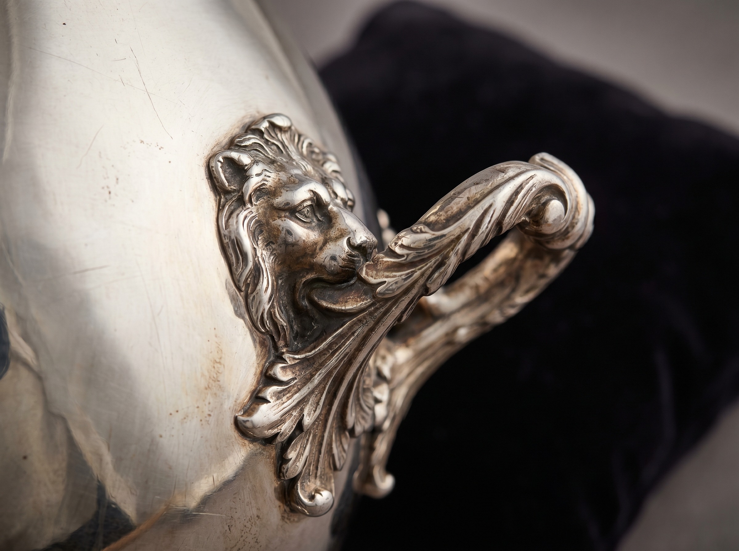 Applied cast lion mask and acanthus ornament on Regency antique sterling silver