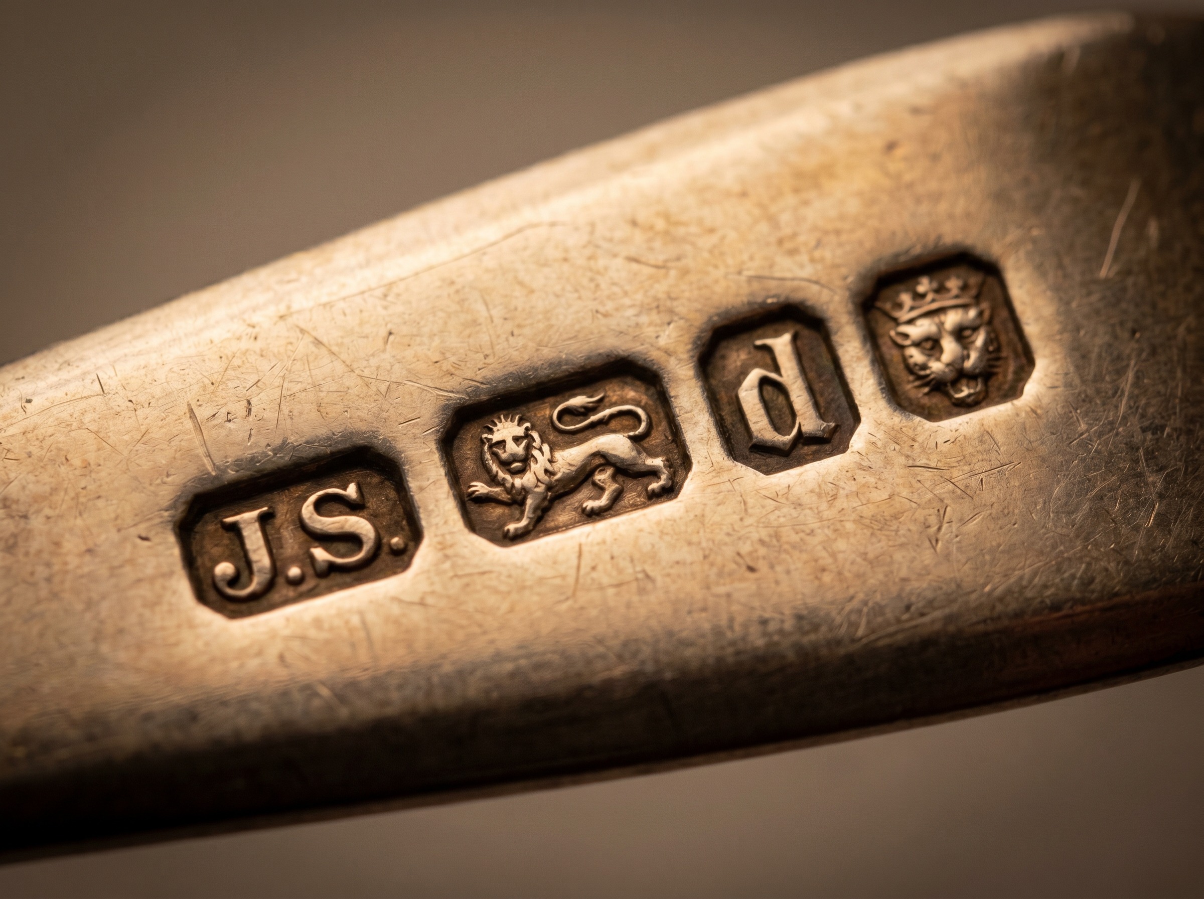 London hallmarks on Regency period sterling silver — maker's initials, lion passant, leopard's head and date letter