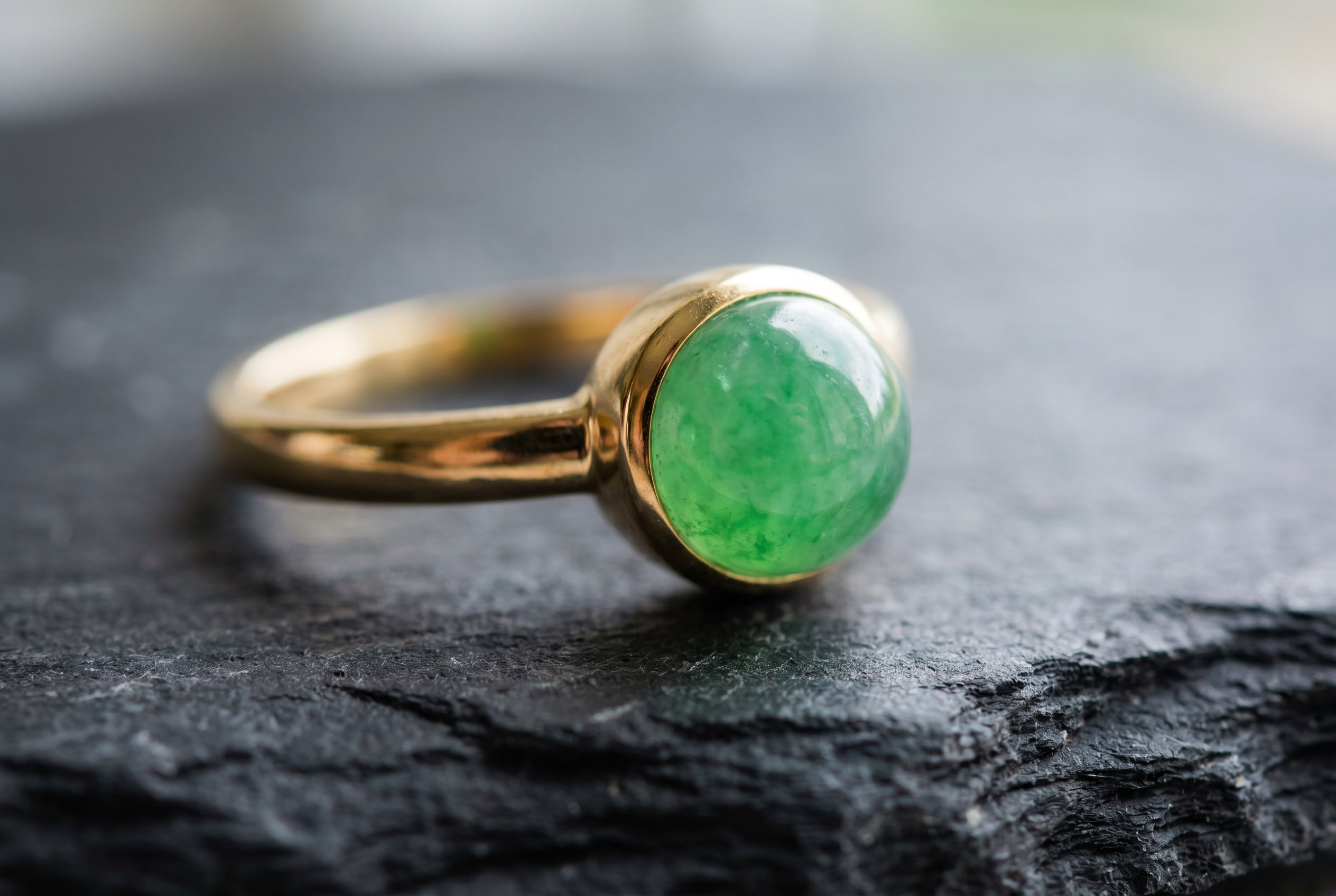 Jadeite cabochon ring in yellow gold