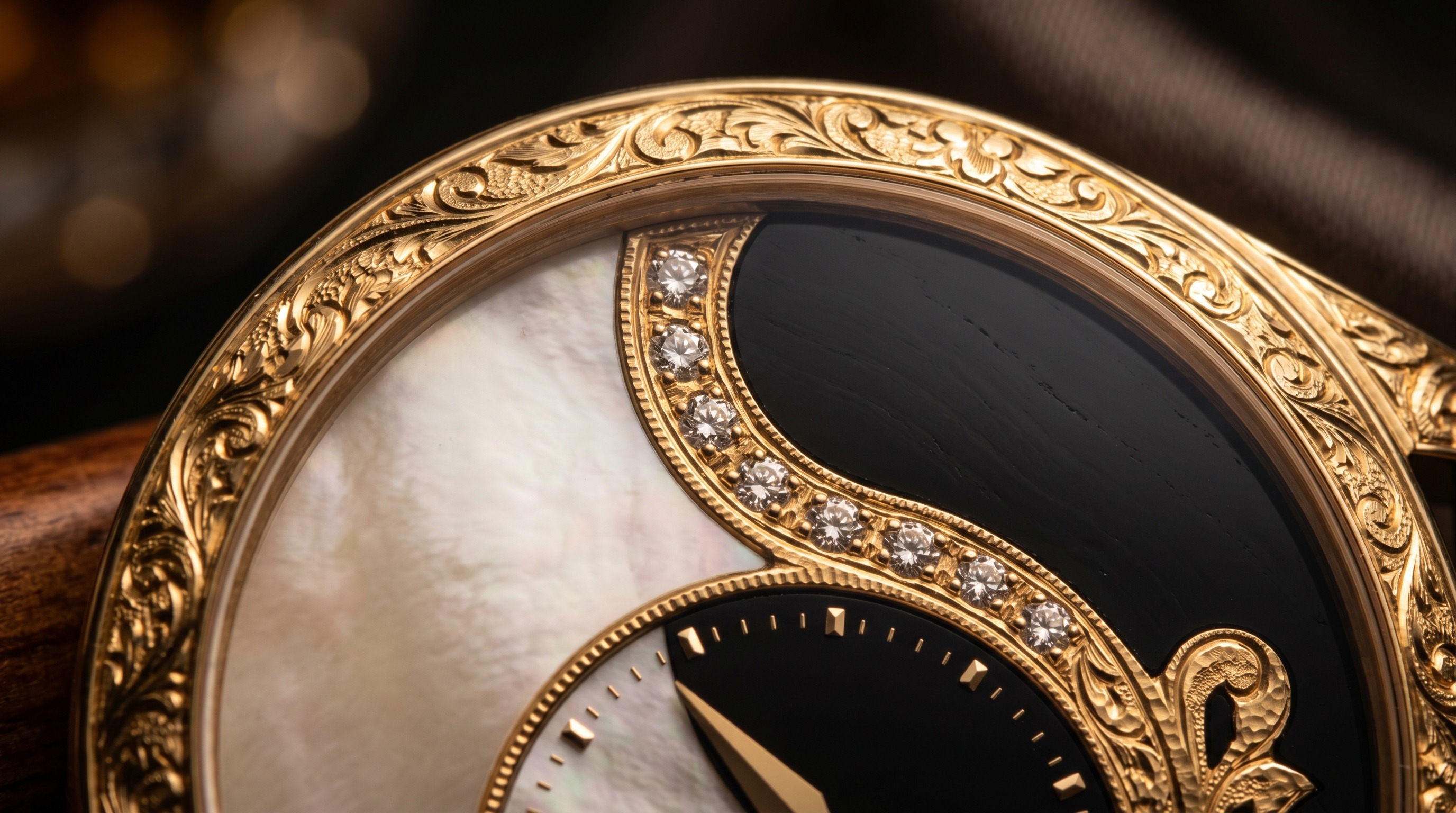 Close-up of Buccellati Opera hand-engraved gold with onyx and mother-of-pearl