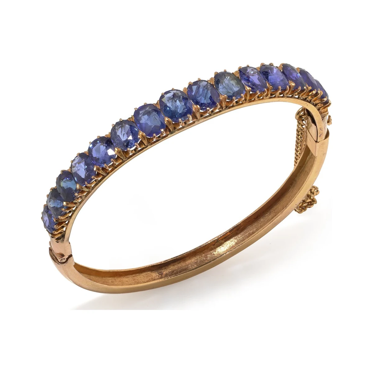 Victorian 18KT gold bangle set with graduated sapphires
