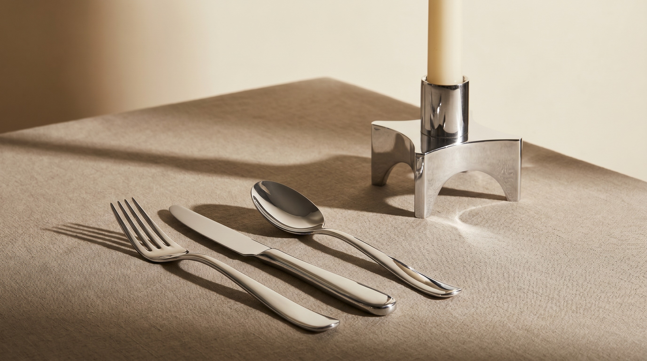 Mid-century modern sterling silver candlestick and cutlery in the style of David Mellor — Mozeris Fine Antiques guide