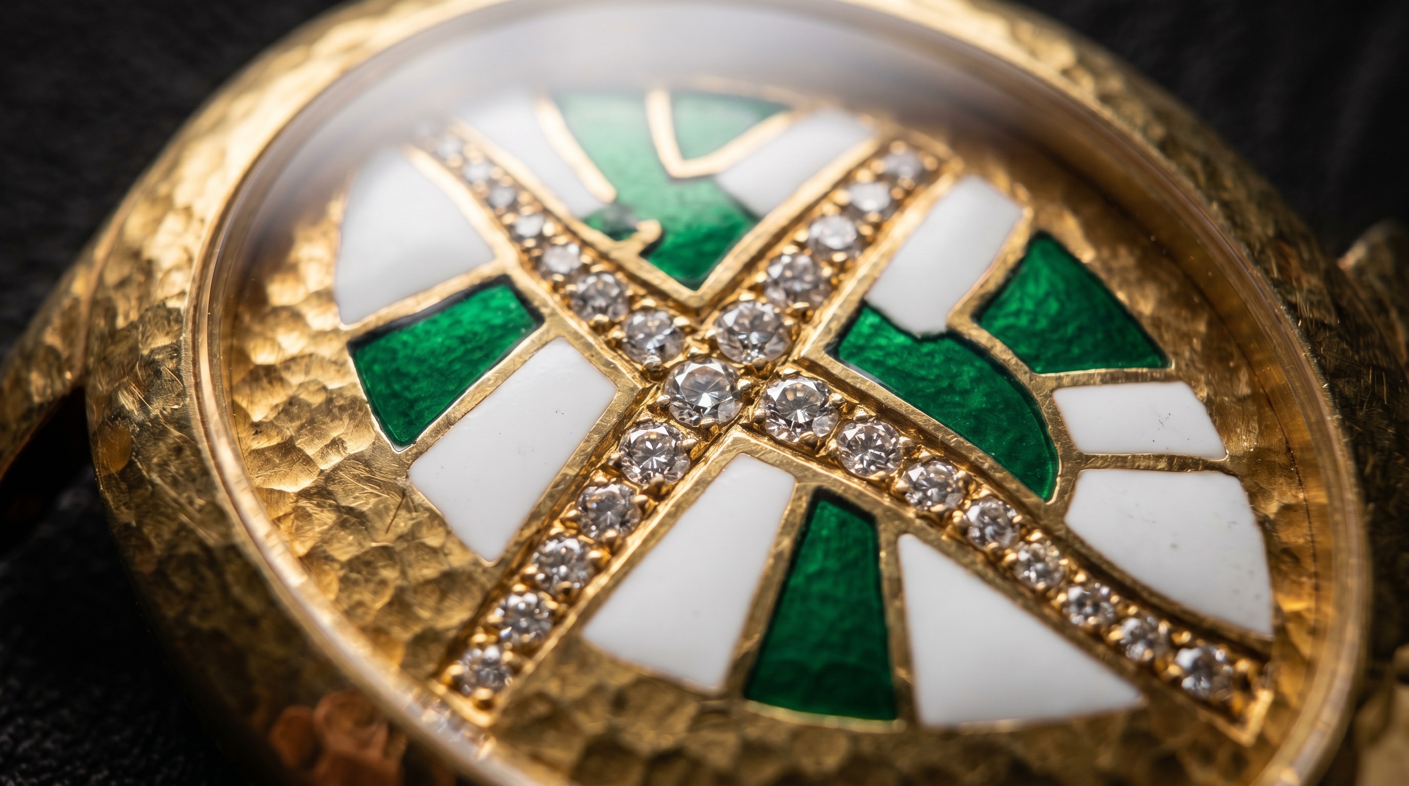 Close-up of David Webb enamel and diamond over hammered gold