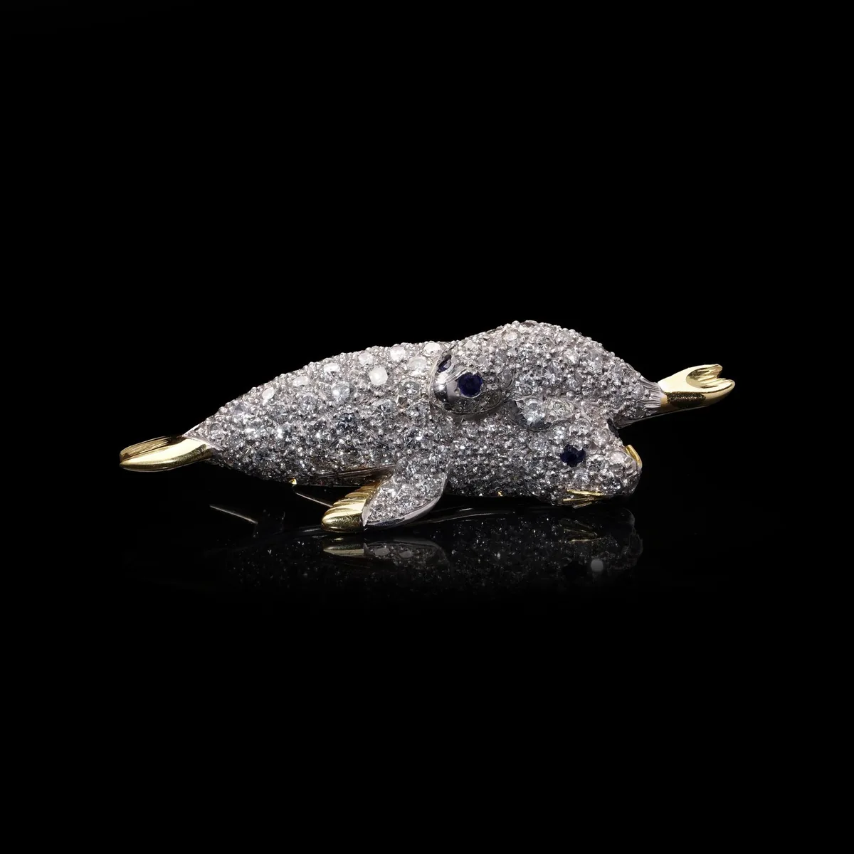 Theo Fennell 18KT gold diamond seal brooch with sapphire eyes, 1970s, bought by Mozeris Fine Antiques