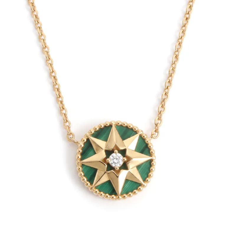 Illustration of a Dior Rose des Vents medallion necklace in yellow gold with malachite and a diamond