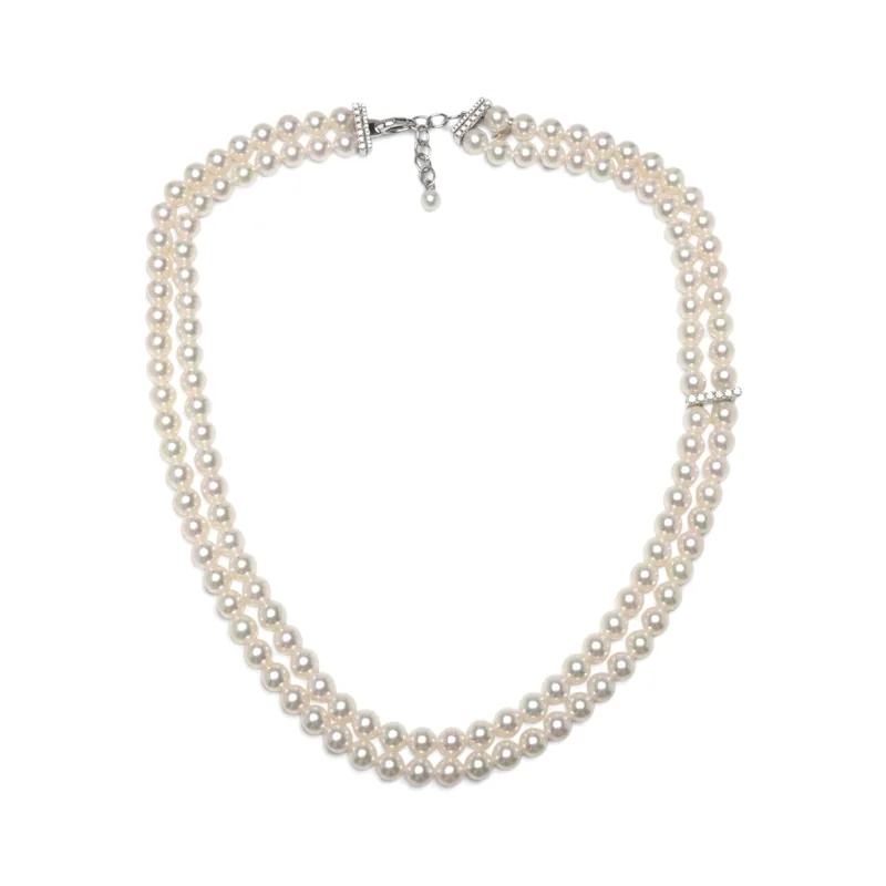 Our Mikimoto double strand cultured pearl necklace with 18KT white gold and diamond clasp, bought by Mozeris Fine Antiques