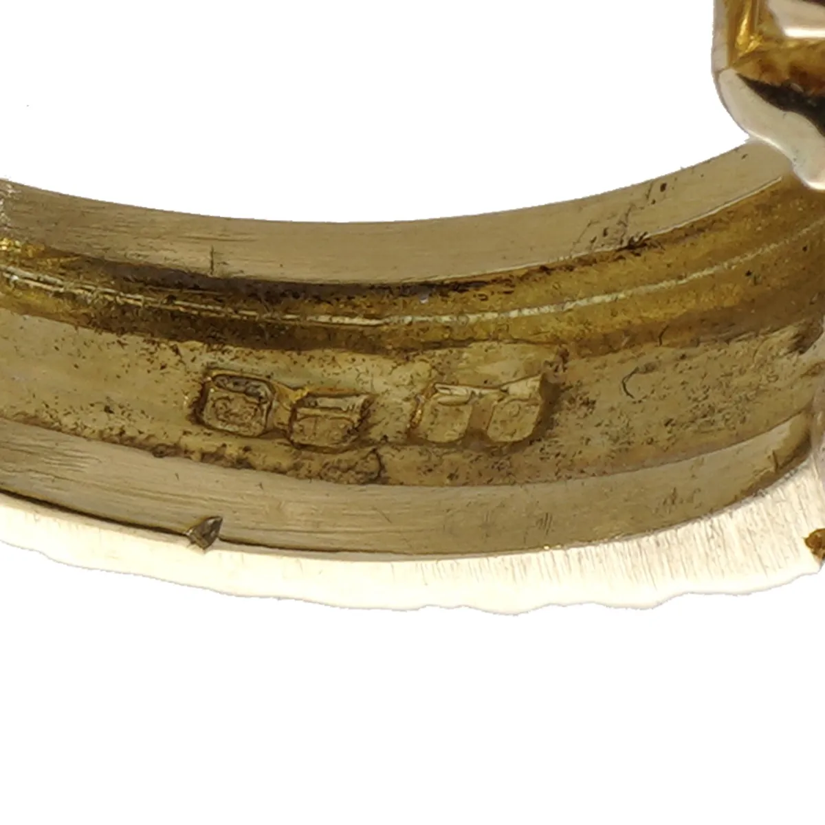 Maker's mark and hallmarks inside an Alan Martin Gard ring