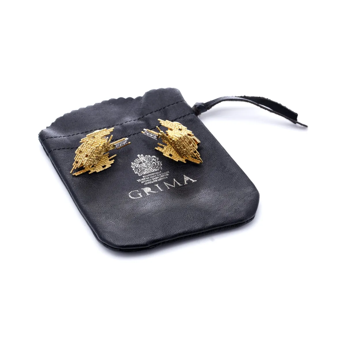 Andrew Grima earrings with their original Grima pouch