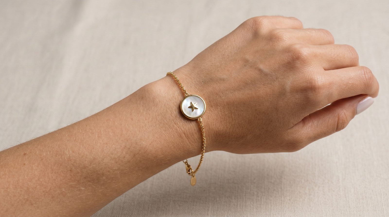 Dior Rose des Vents gold chain bracelet with diamond star medallion