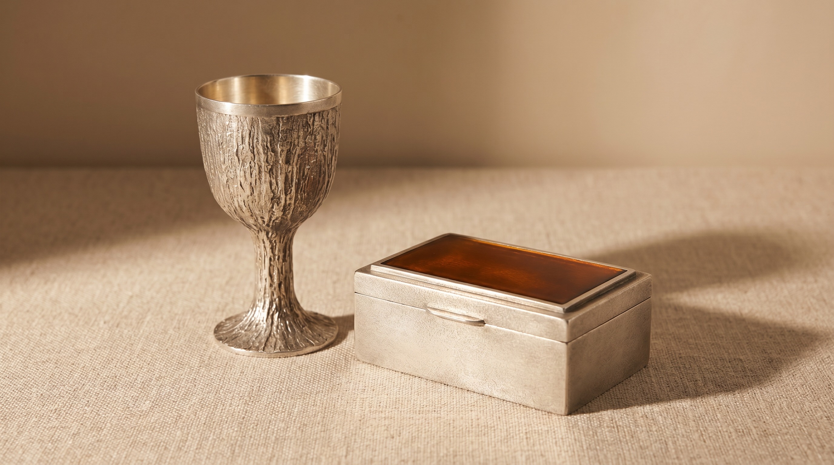 Mid-century modern sterling silver goblet with bark texture in the style of Gerald Benney — Mozeris Fine Antiques guide