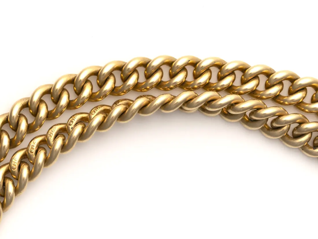 Curb links of an Edwardian 18KT gold Albert chain