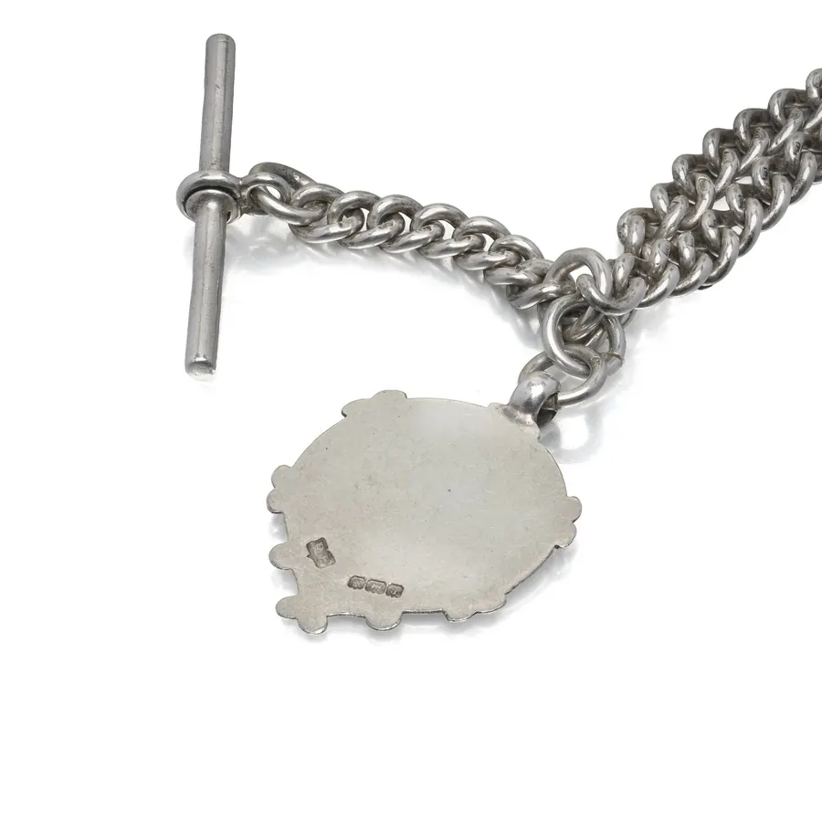 T-bar and 9KT gold shield fob on an antique silver Albert chain, Birmingham 1926