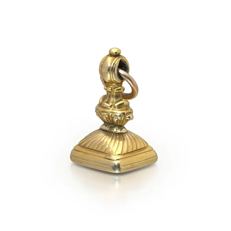 19th century 15KT gold seal fob with a chalcedony intaglio, the kind worn on an Albert chain