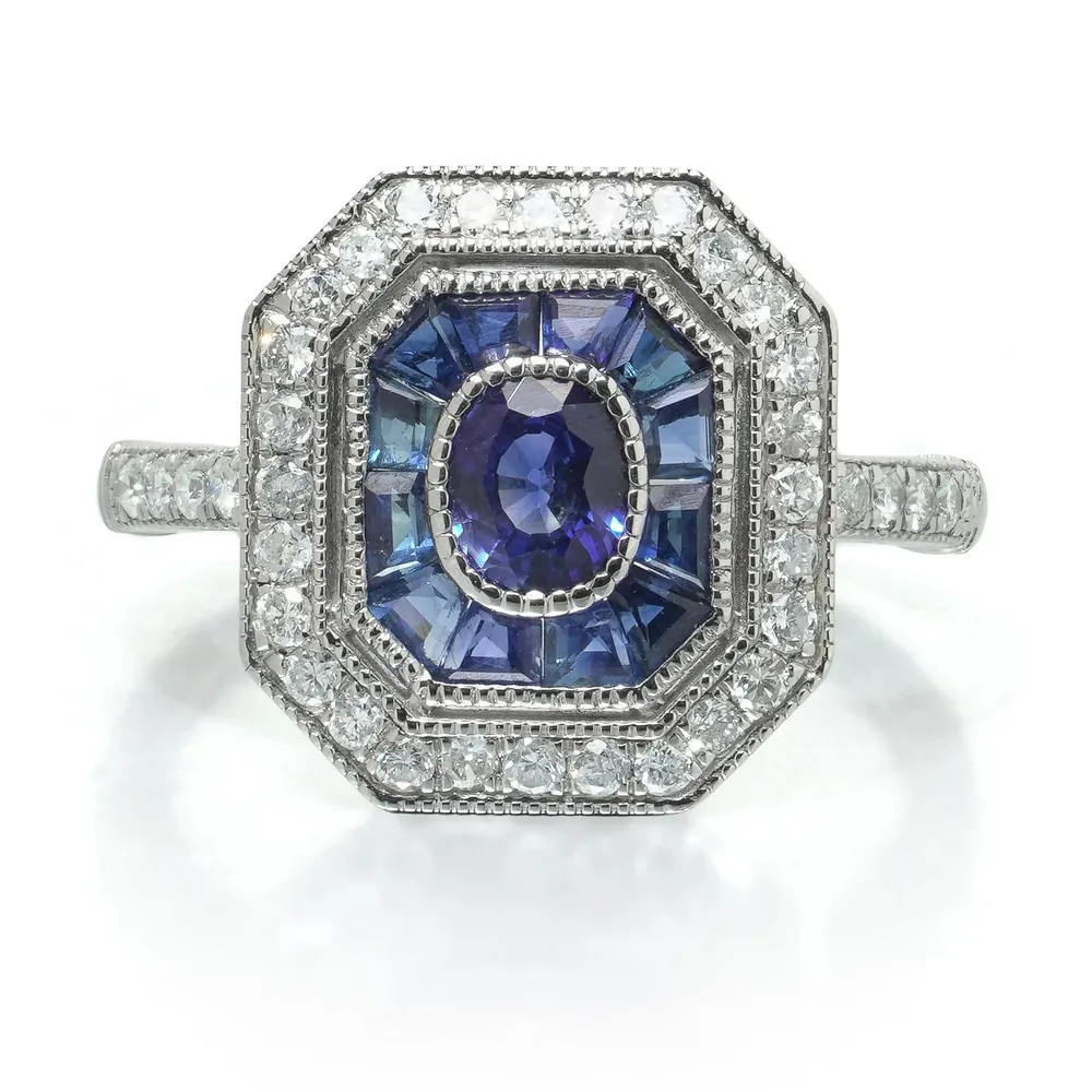 A modern Art Deco style platinum sapphire and diamond ring
