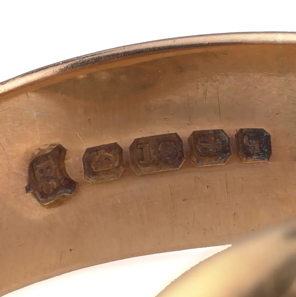 Birmingham hallmarks for 1915 inside an Edwardian 18ct gold snake ring