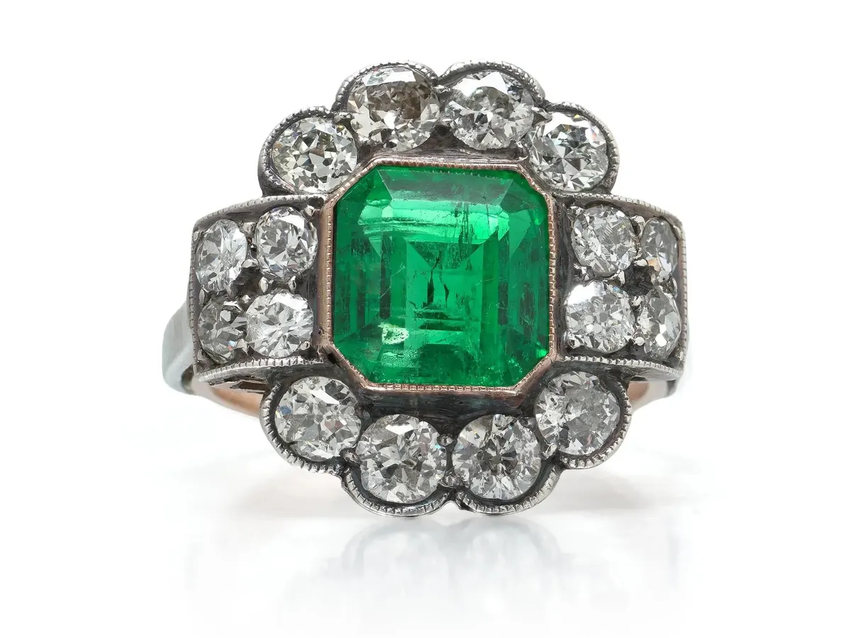 Victorian Colombian emerald and diamond cluster ring in gold and silver