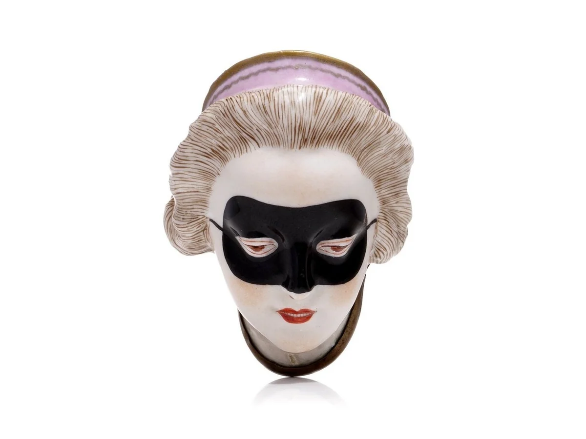 Meissen hard-paste porcelain patch box modelled as a masquerade lady, about 1750, with a copper mount