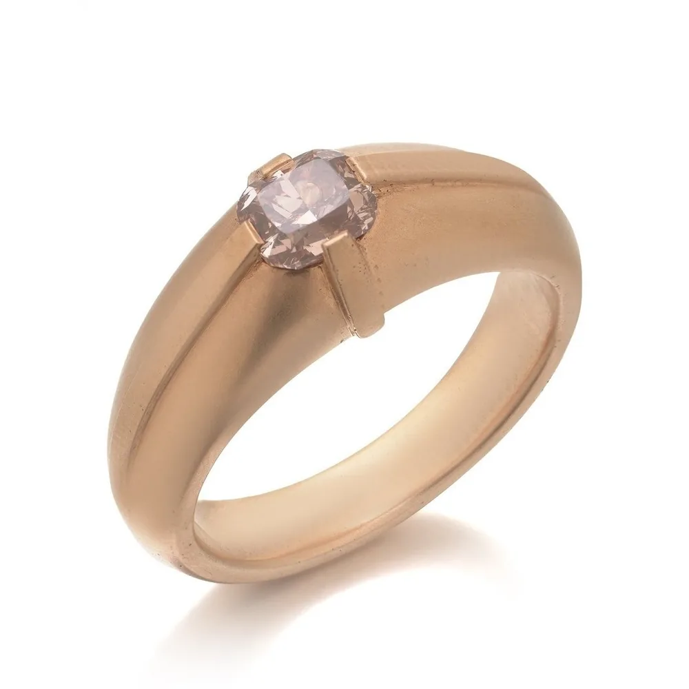 Antique 18ct gold band with a pink old cushion cut diamond set flush in the gold