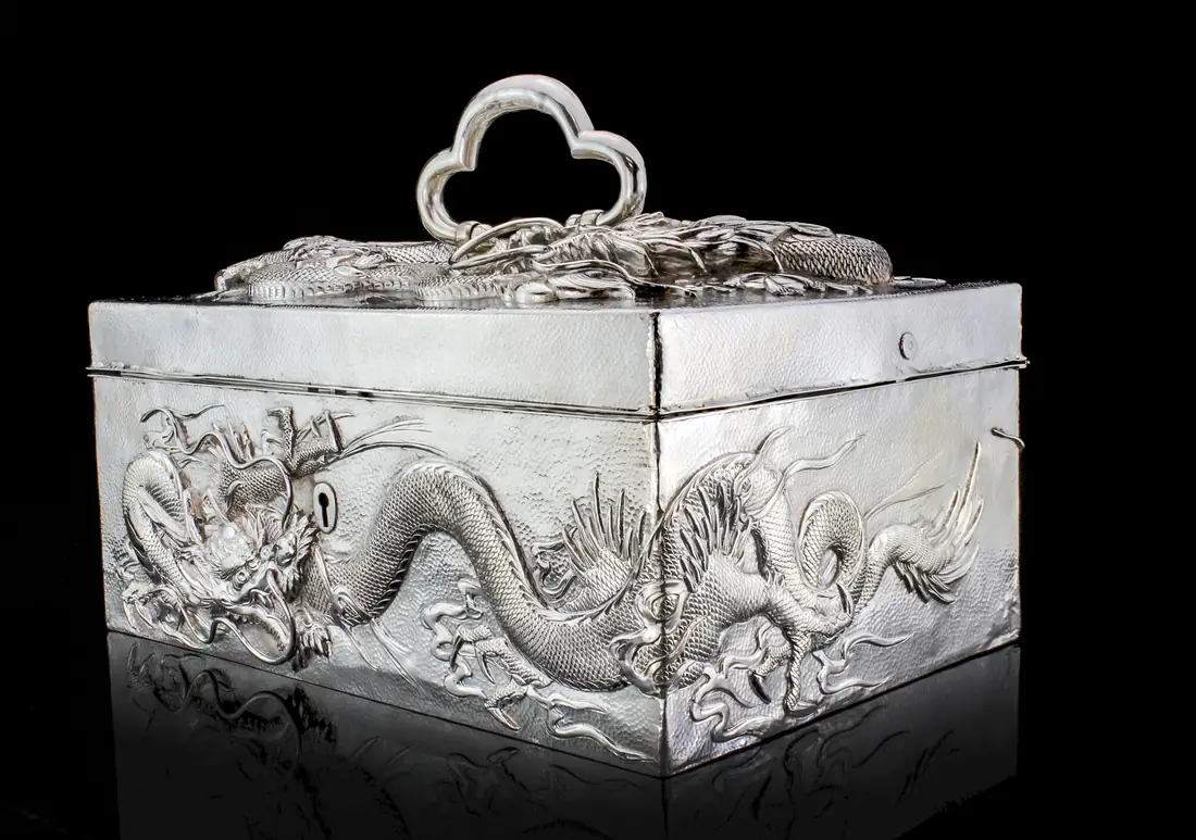Antique Chinese export silver box chased with dragons, 1880 to 1920