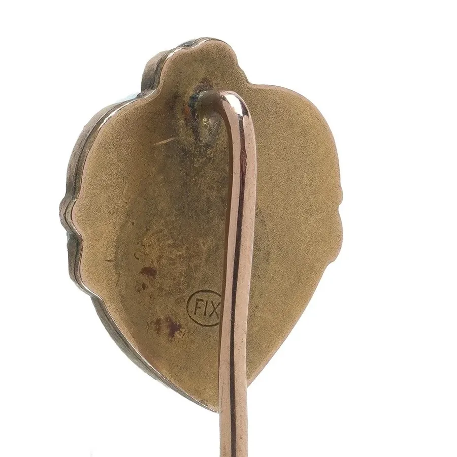 Reverse of a French rolled gold stick pin, struck FIX in an oval