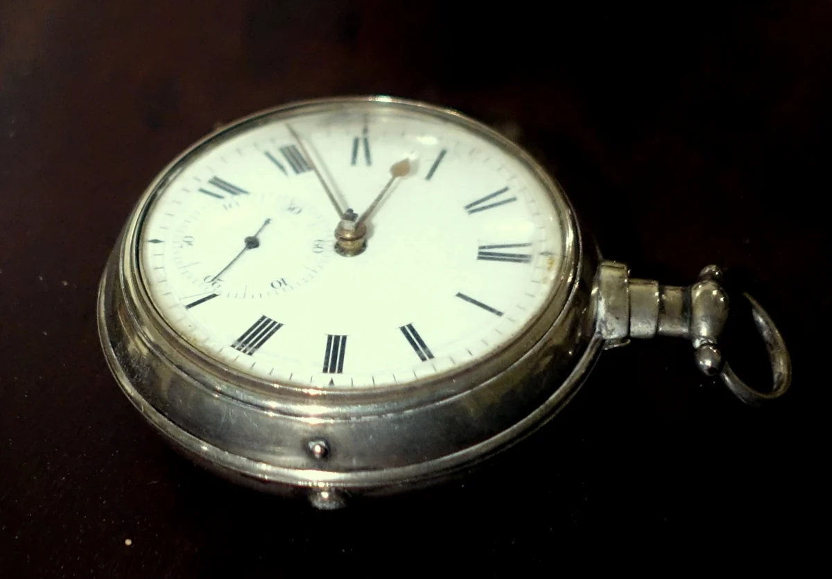 Silver open face pocket watch by William Hopeton, London, 1815, with a white enamel dial and Roman numerals