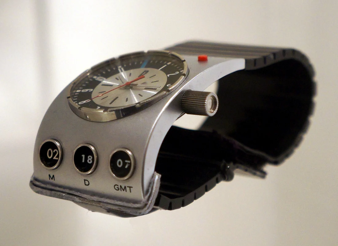 A futuristic steel cuff watch with a round dial and three small date windows, made by Hamilton for 2001: A Space Odyssey