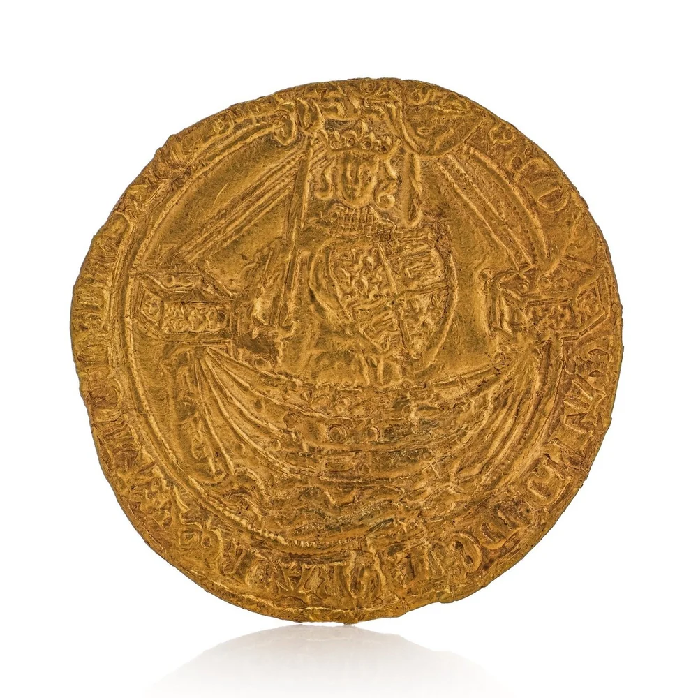 An Edward III gold noble of 1361 to 1369, showing the king standing in a ship