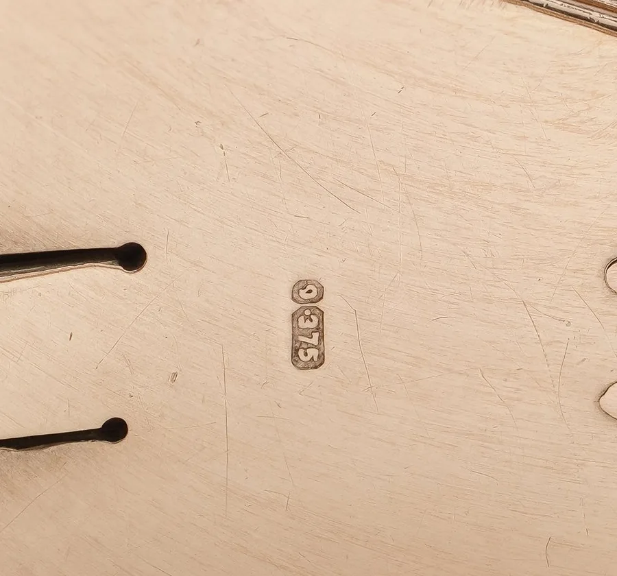 9 and .375 stamped on the clasp of a 1950s 9KT gold bracelet watch, from our collection