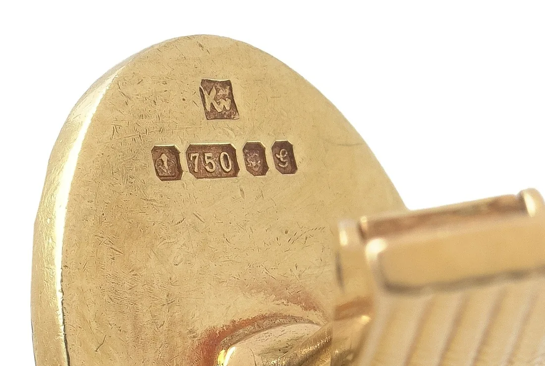 British hallmarks including 750 on 18KT gold cufflinks by Kutchinsky, from our collection