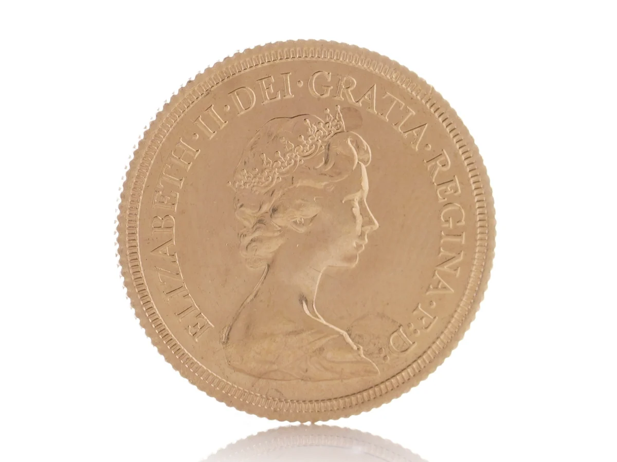 The portrait side of a 1979 gold sovereign: Elizabeth II, with the legend ELIZABETH II DEI GRATIA REGINA F D