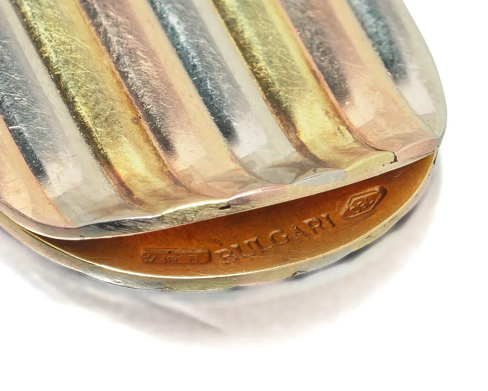 Three colours of gold and the BULGARI signature on a vintage 18KT gold money clip