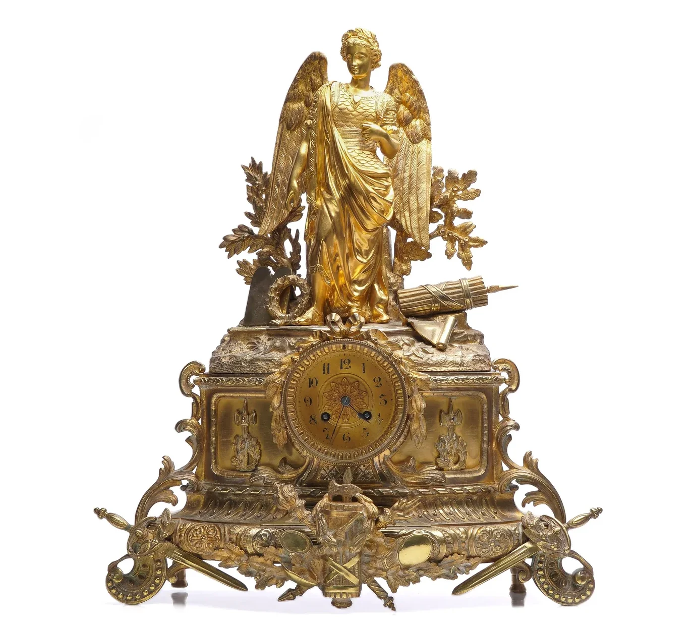A 19th-century French gilt bronze mantel clock with a winged figure above the dial