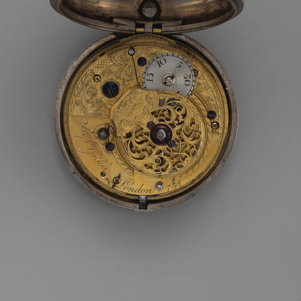 Gilt English full plate verge movement signed Stephen Gibbs London with a pierced and engraved balance cock and silver regulator disc