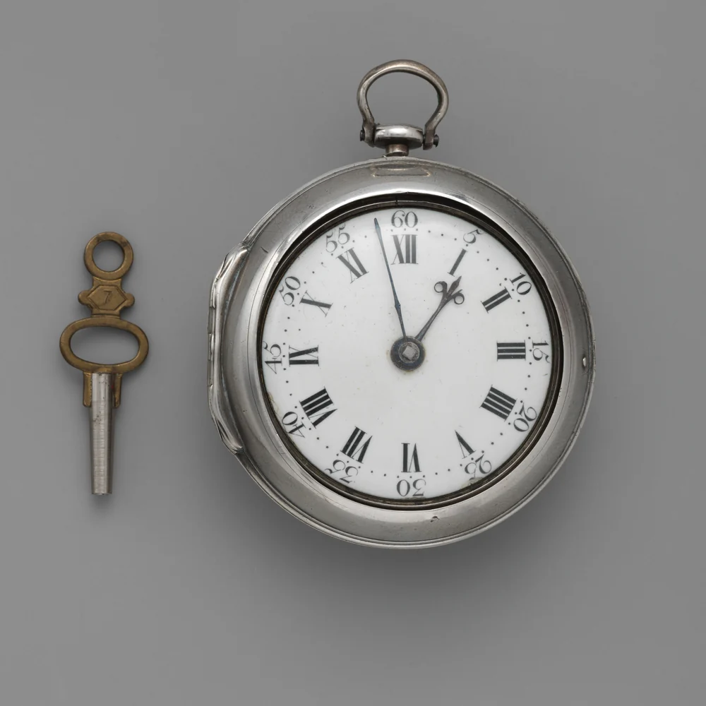 Silver pair-case pocket watch by Stephen Gibbs, London, 1770, with white enamel dial and its winding key