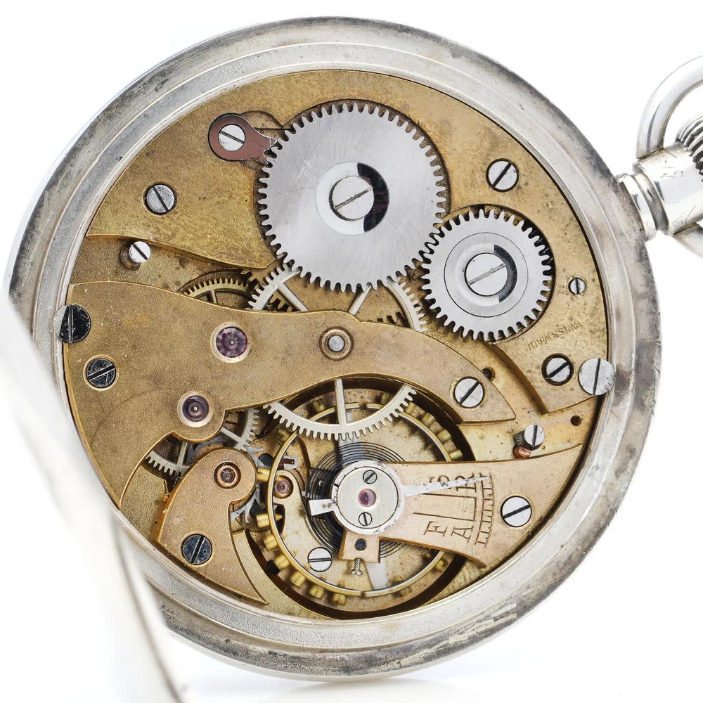 Swiss lever movement inside a Wilsdorf and Davis sterling silver pocket watch, with steel winding wheels and screwed bridges