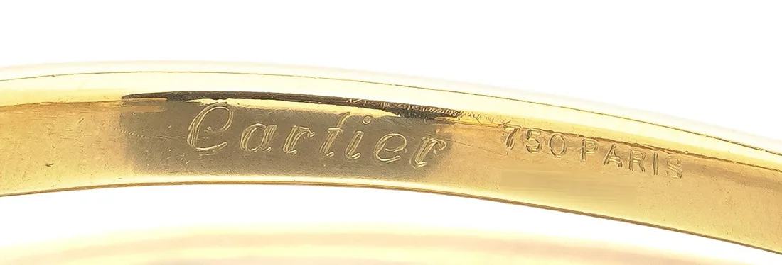 Cartier 750 PARIS engraved inside an 18KT gold rope twist bangle
