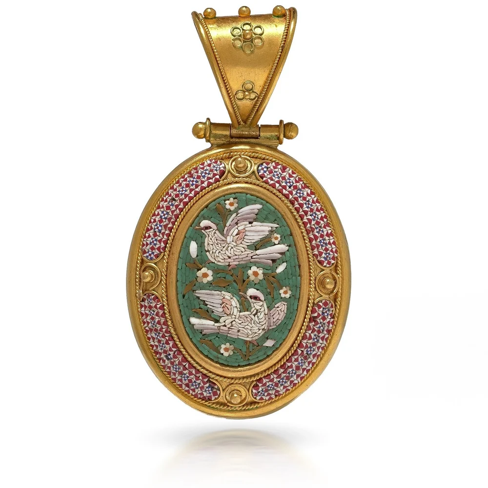 A 19th century high carat gold mourning pendant with a micromosaic of two white doves on flowering branches against green, in a border of red, white and blue tesserae, with a tall bale