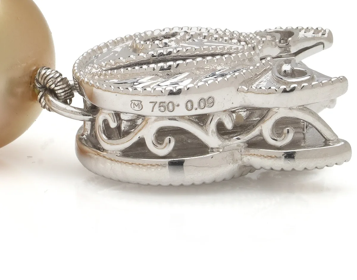 Mikimoto white gold pearl necklace clasp stamped with the M maker's mark, 750 and 0.09