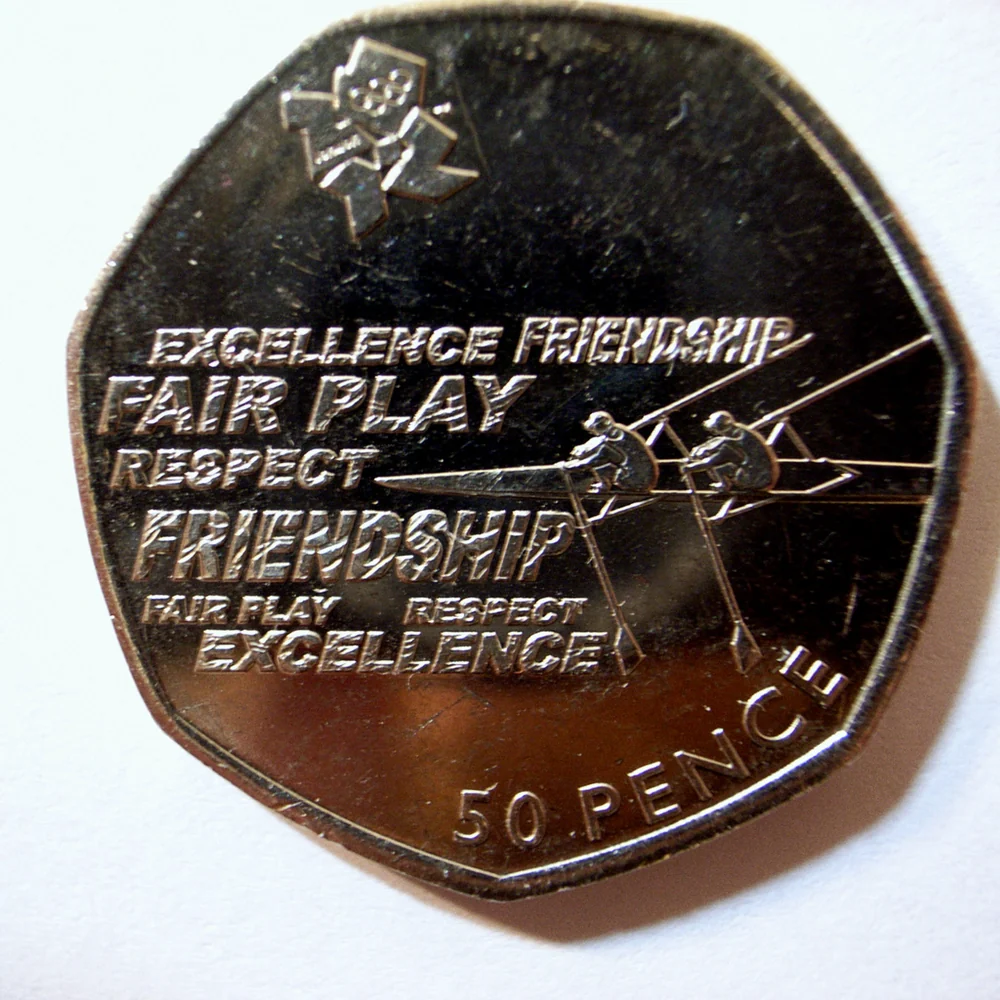 A London 2012 Olympic Rowing 50p showing two rowers and the words Excellence, Friendship, Fair Play and Respect