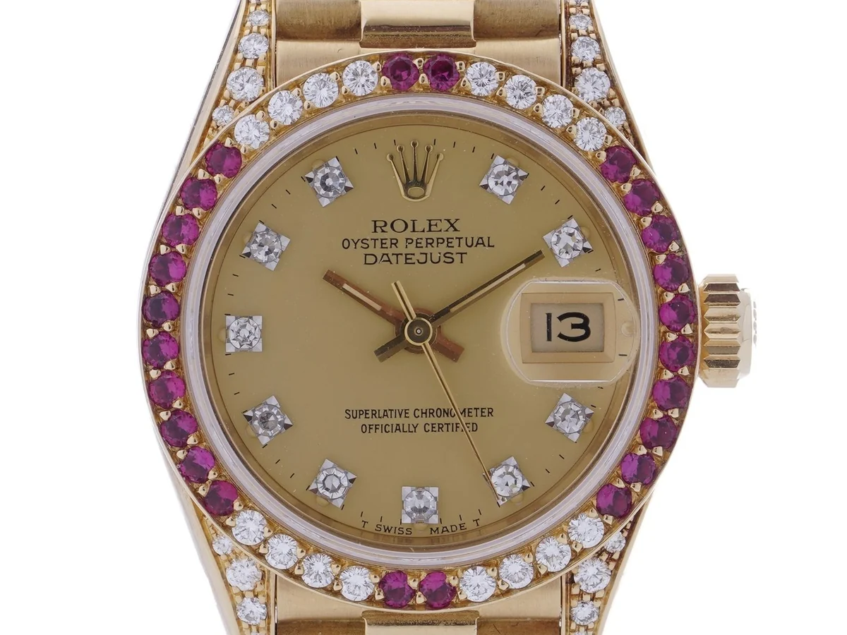 Rolex Lady Datejust ref. 69038 in 18ct gold with factory-set diamond hour markers, ruby and diamond bezel and diamond-set lugs
