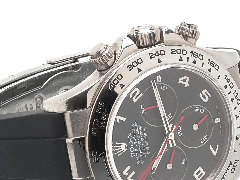 Rolex Daytona 116519 in white gold seen from the side, showing the screw-down crown, crown guards and screw-down chronograph pushers